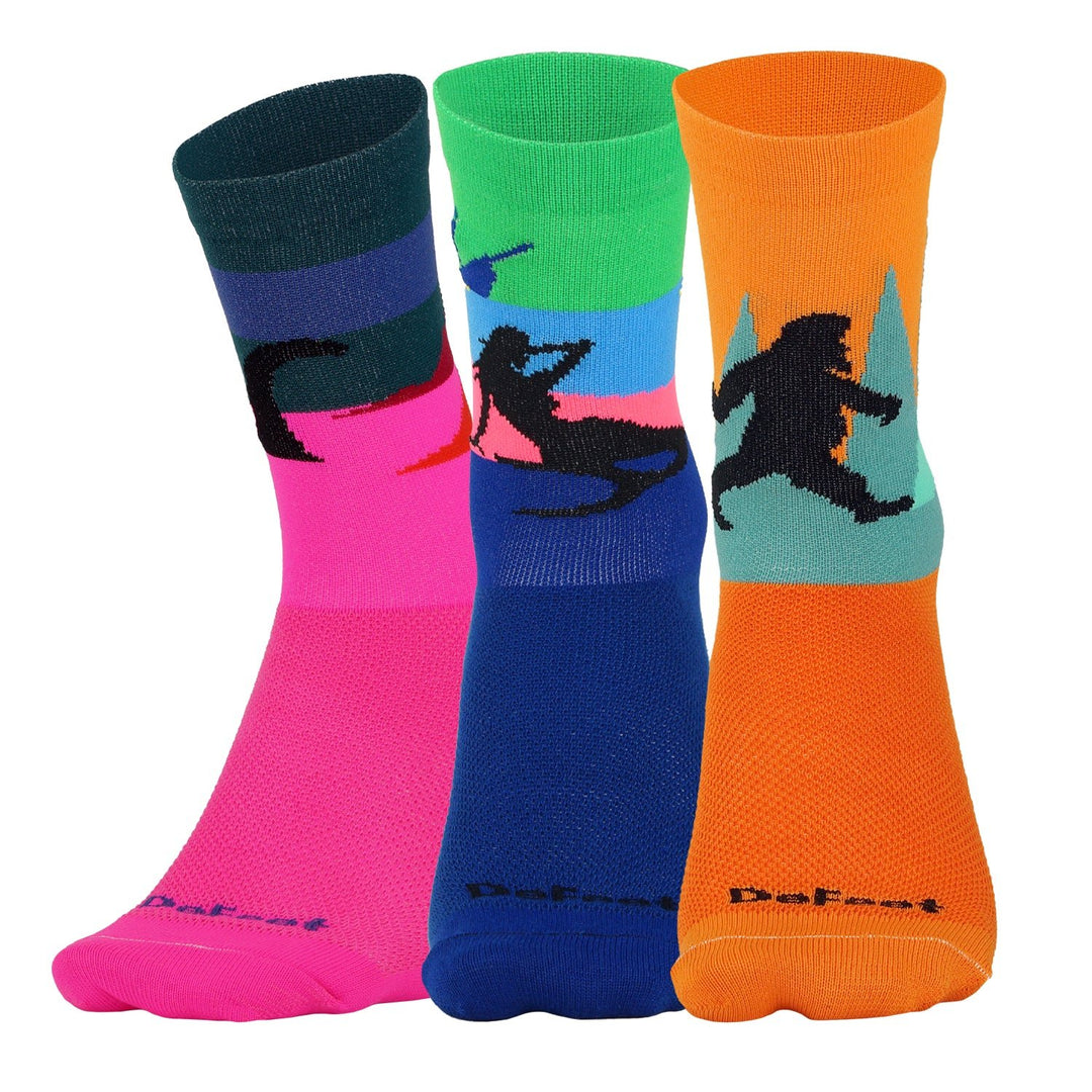 three colorful crew athletic socks with the Loch Ness monster, a mermaid siren, and bigfoot sasquatch yeti