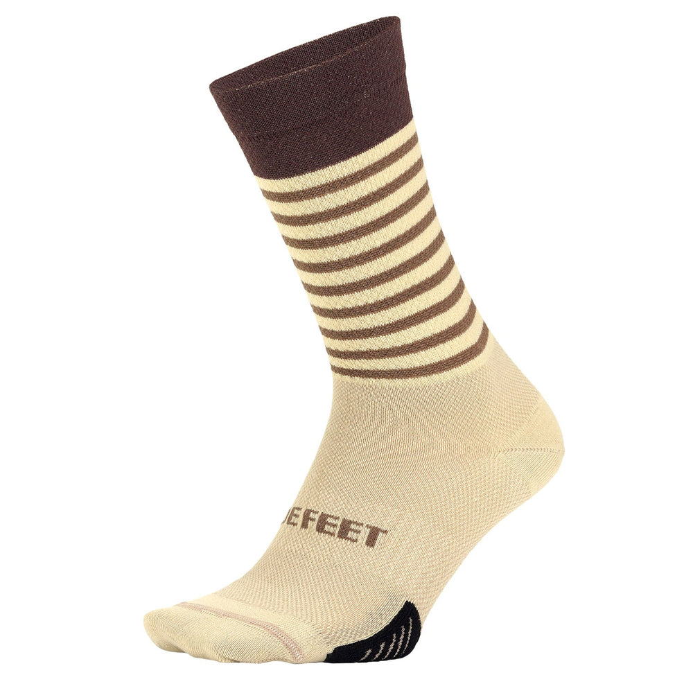 a tan crew cycling socks with brown stripes and cuff