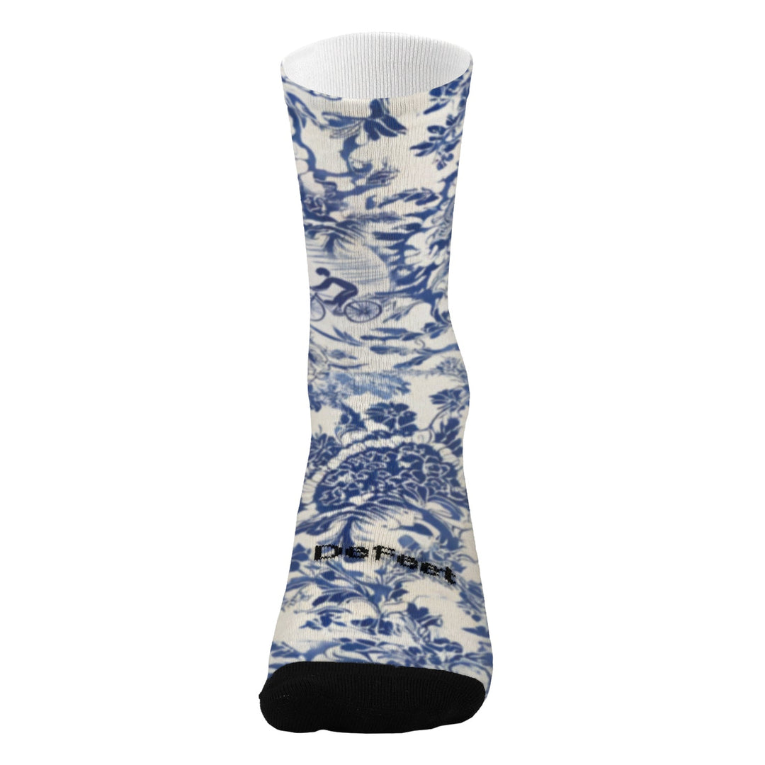 DeFeet Ikigai sock with blue floral pattern on a white background