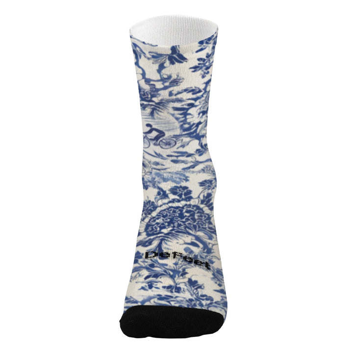 DeFeet Ikigai sock with blue floral pattern on a white background