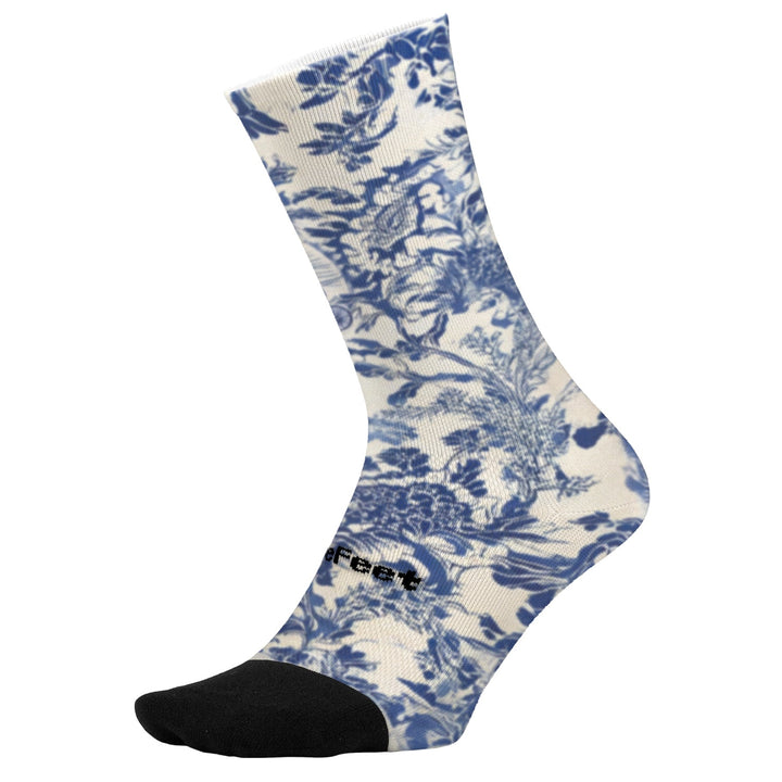 DeFeet Ikigai sock with blue floral pattern on a white background