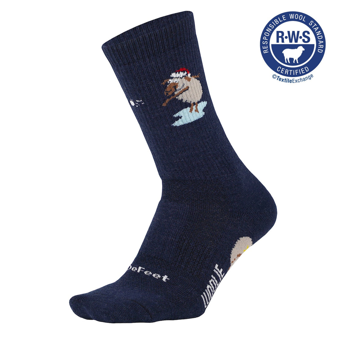 navy blue holiday Woolie Boolie wool sock featuring Lambert the sheep throwing a snowball