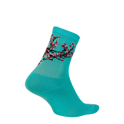 low crew cycling sock for women in aqua with cherry blossoms on the back of the cuff