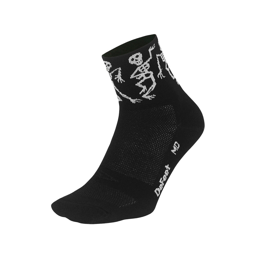 Aireator 3" cuff cycling sock in black with white skeletons around cuff